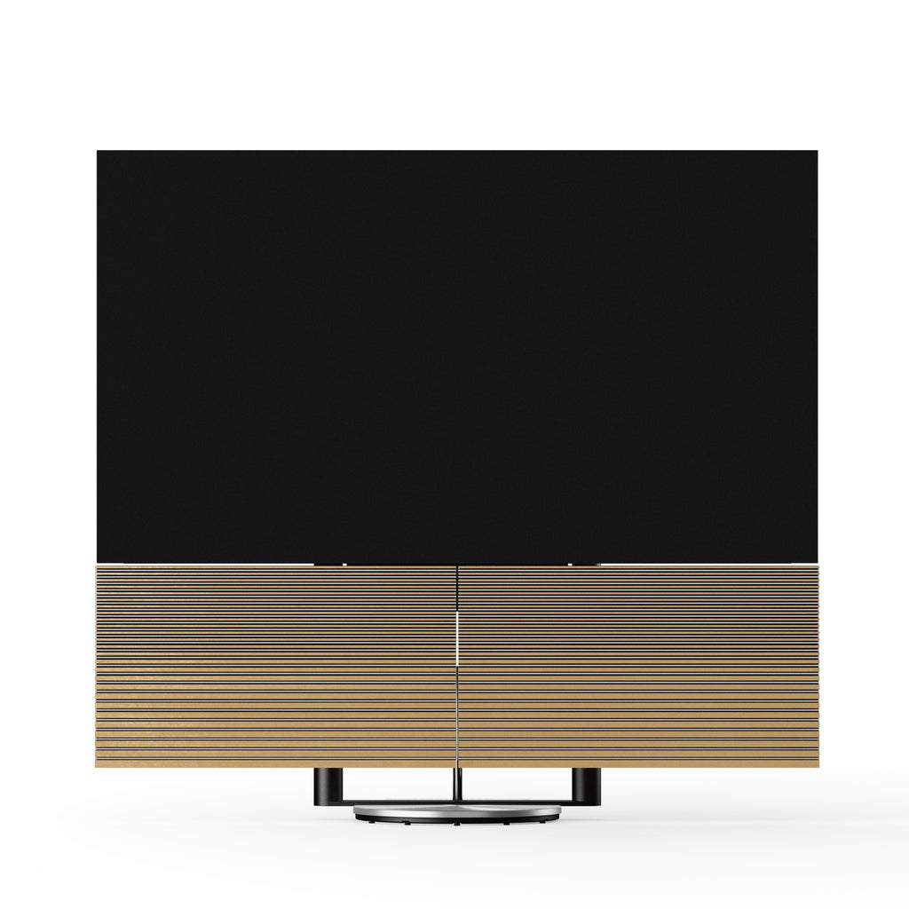 Beovision Harmony Silver mit Cover in Oak auf Motorbodenstandfuß frontal mit offenem Soundcenter